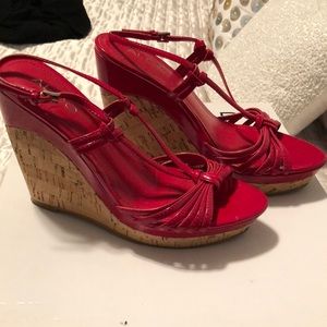 Red patent leather wedge heels